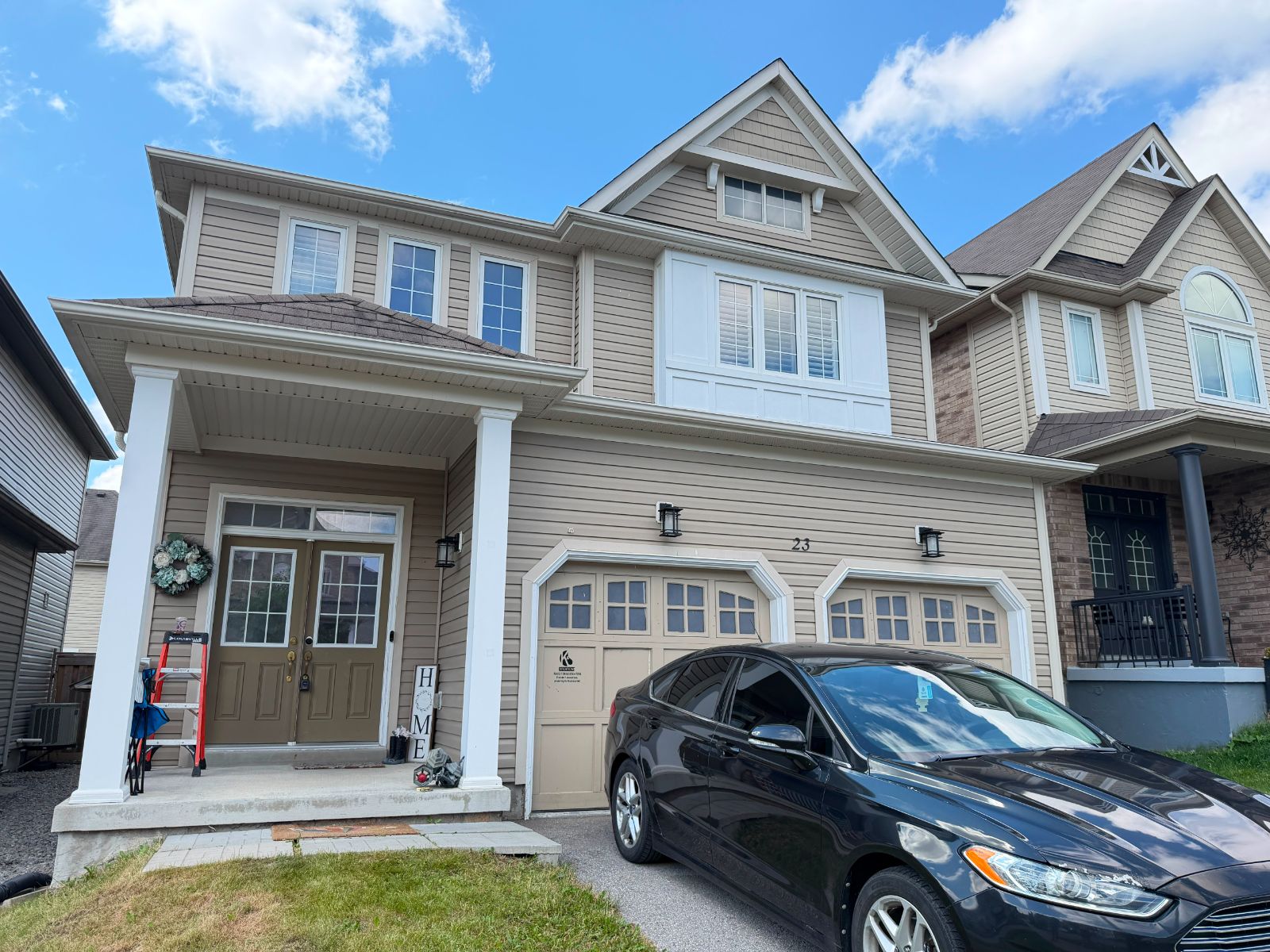 Exterior painting before photo — beige two-storey home, GTA