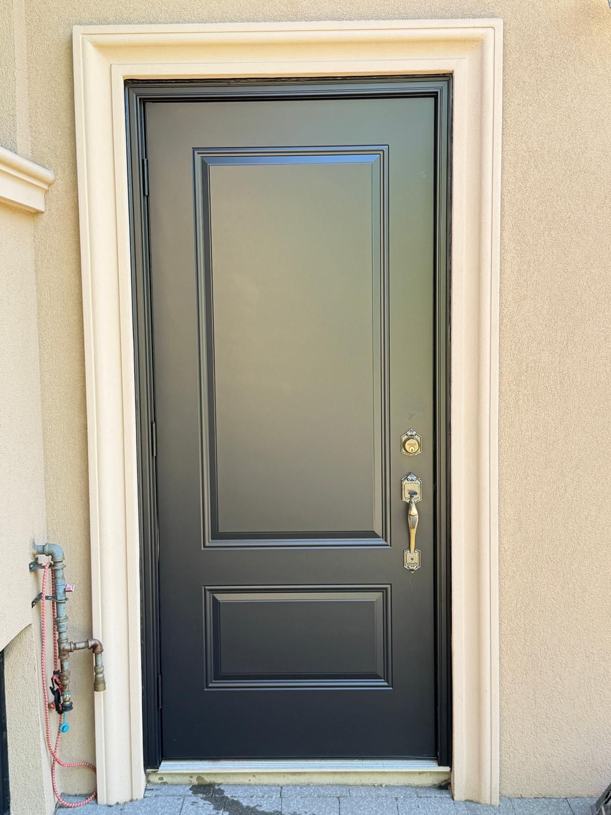 Exterior door painted black β detail of clean finish, GTA